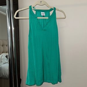 Cabi size S emerald green sleeveless silky blouse with polka dot pattern.